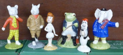 A collection of Beswick figures; Rupert Bear, Podgy Pig, Fly Fishing, Droopy, Wilma Flintstone and