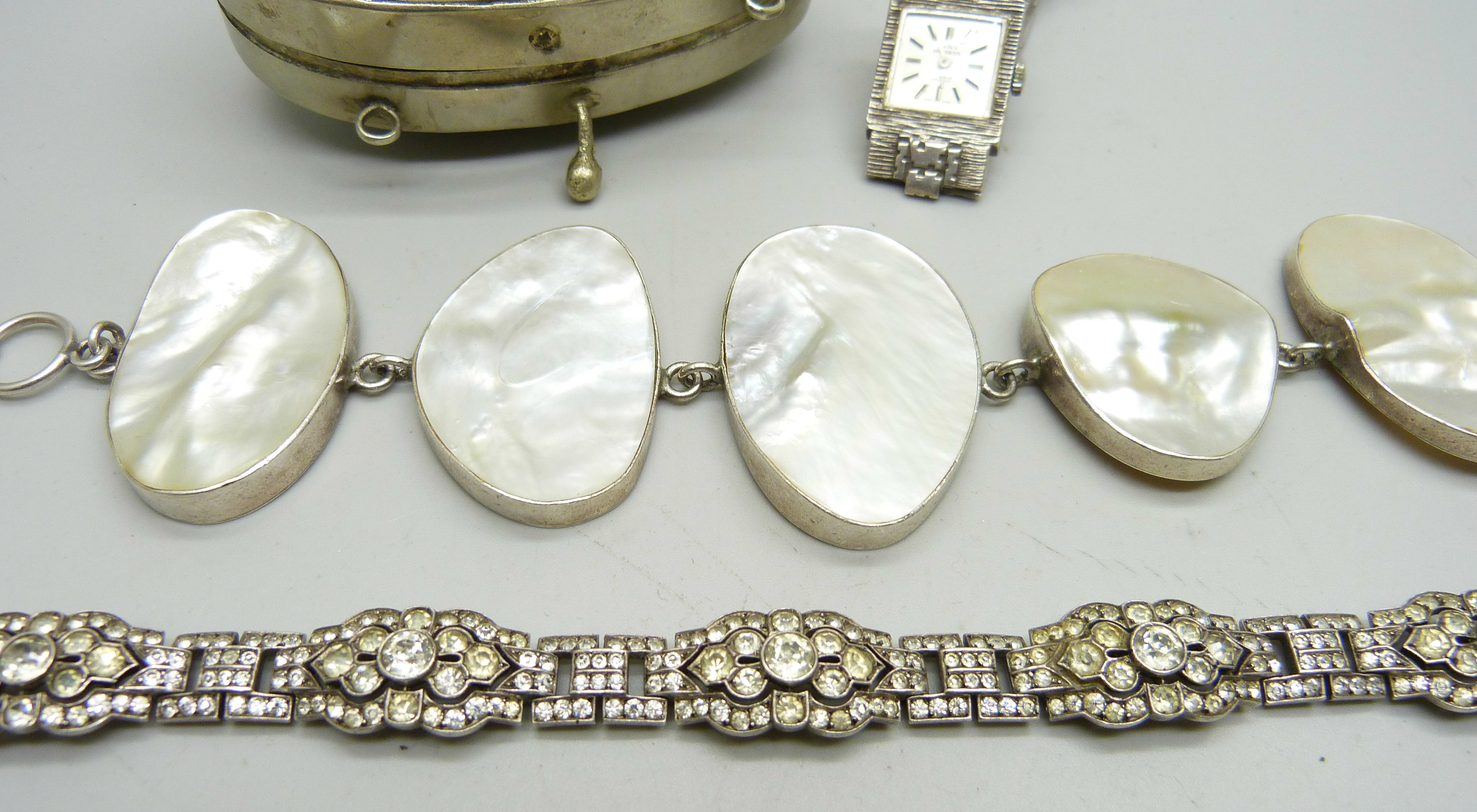 A silver and mother of pearl bracelet, a silver and paste set bracelet, a lady's silver cocktail - Image 3 of 5