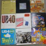 A collection of nine UB40 LP records, two 12" singles and a 7" single and CD