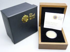 The Royal Mint, a George III gold Guinea 1774, boxed with certificate
