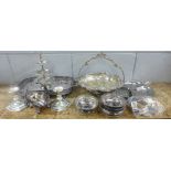 A collection of silver plated items including a gallery tray, a pair of candlesticks, an Art Nouveau