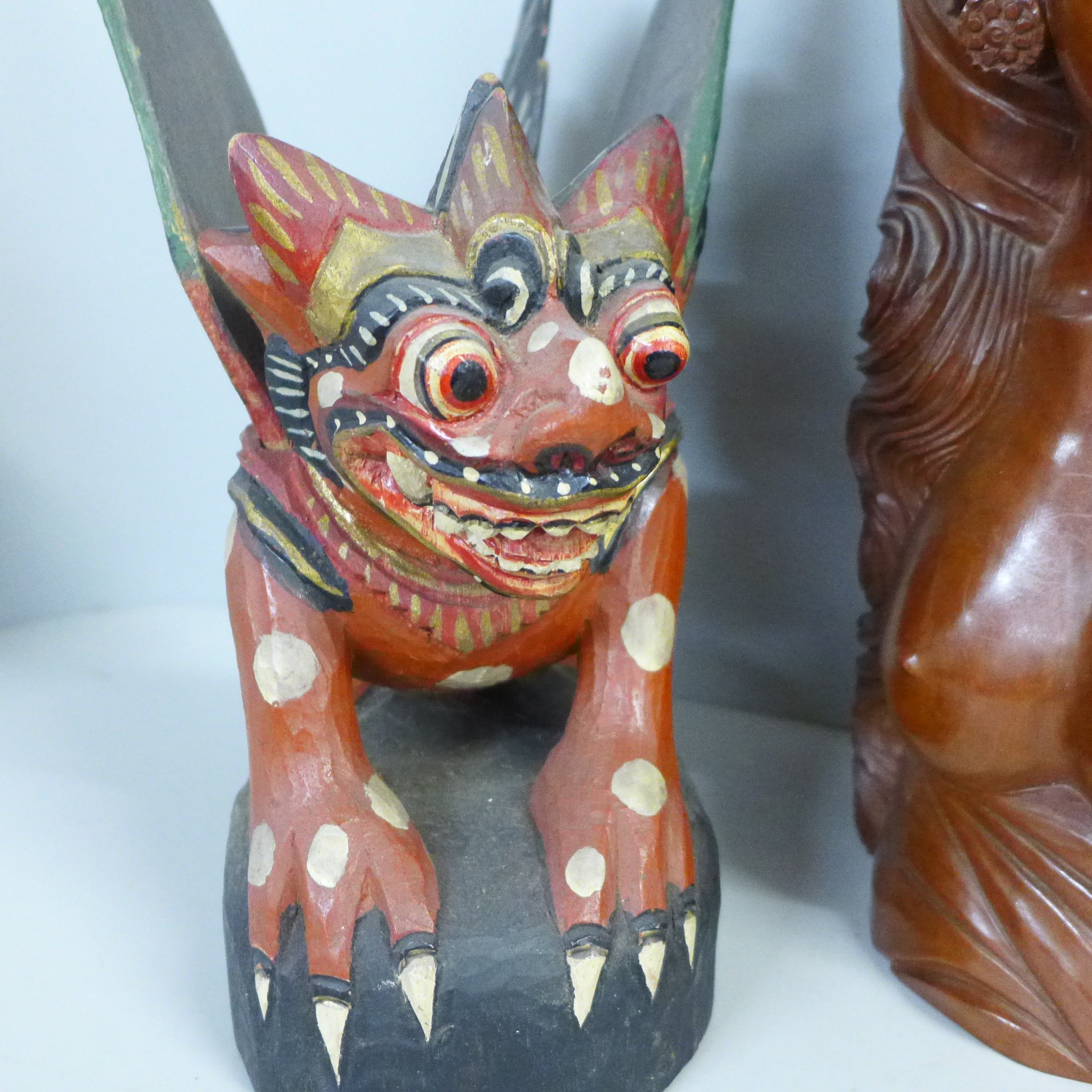 A carved wooden bust of a South East Asian girl and a Chinese painted carving of a dragon - Image 2 of 4