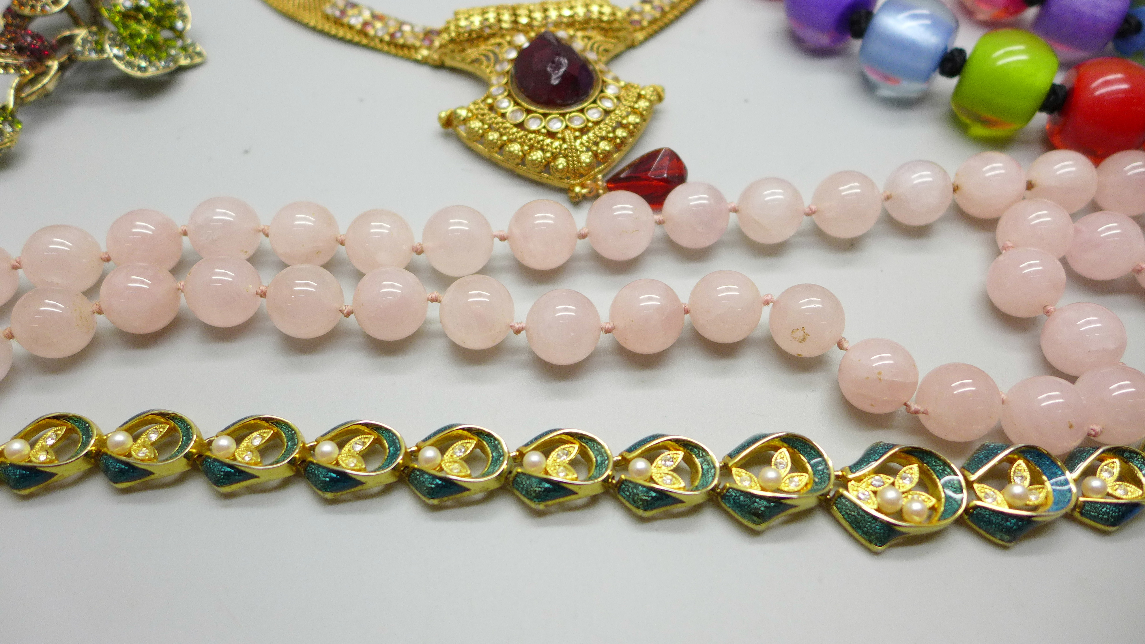 A rose quartz necklace, a large costume brooch/pendant set with rhinestones, a Claxton London - Image 4 of 4