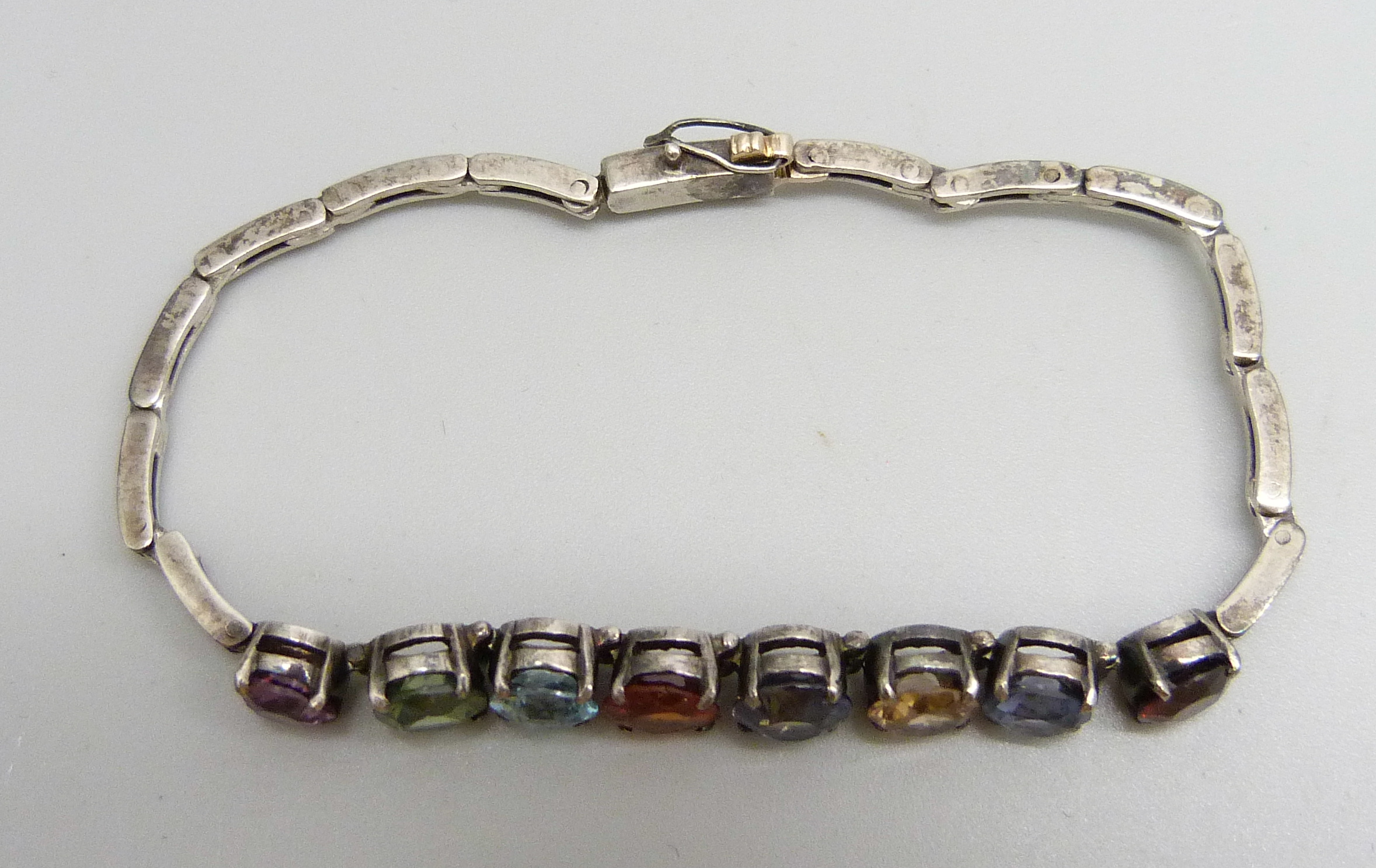 A white metal bracelet set with eight multi-coloured stones, 8g, 16.5cm long - Image 2 of 2