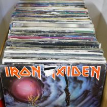A box of 1970s/1980s 7" singles including Iron Maiden, Stranglers, David Bowie, The Pretenders, etc.