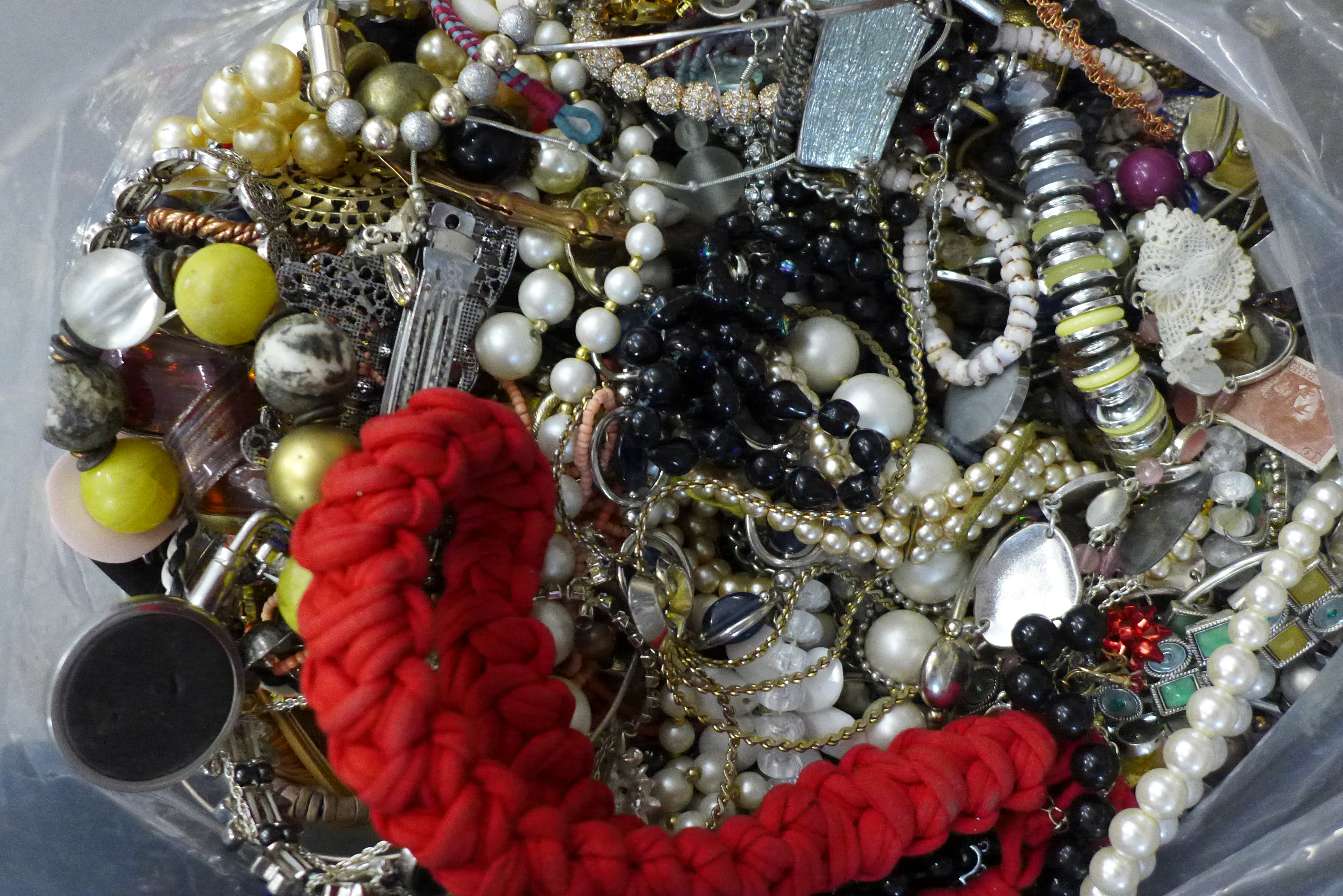 A large bag of costume jewellery, approx 8kg