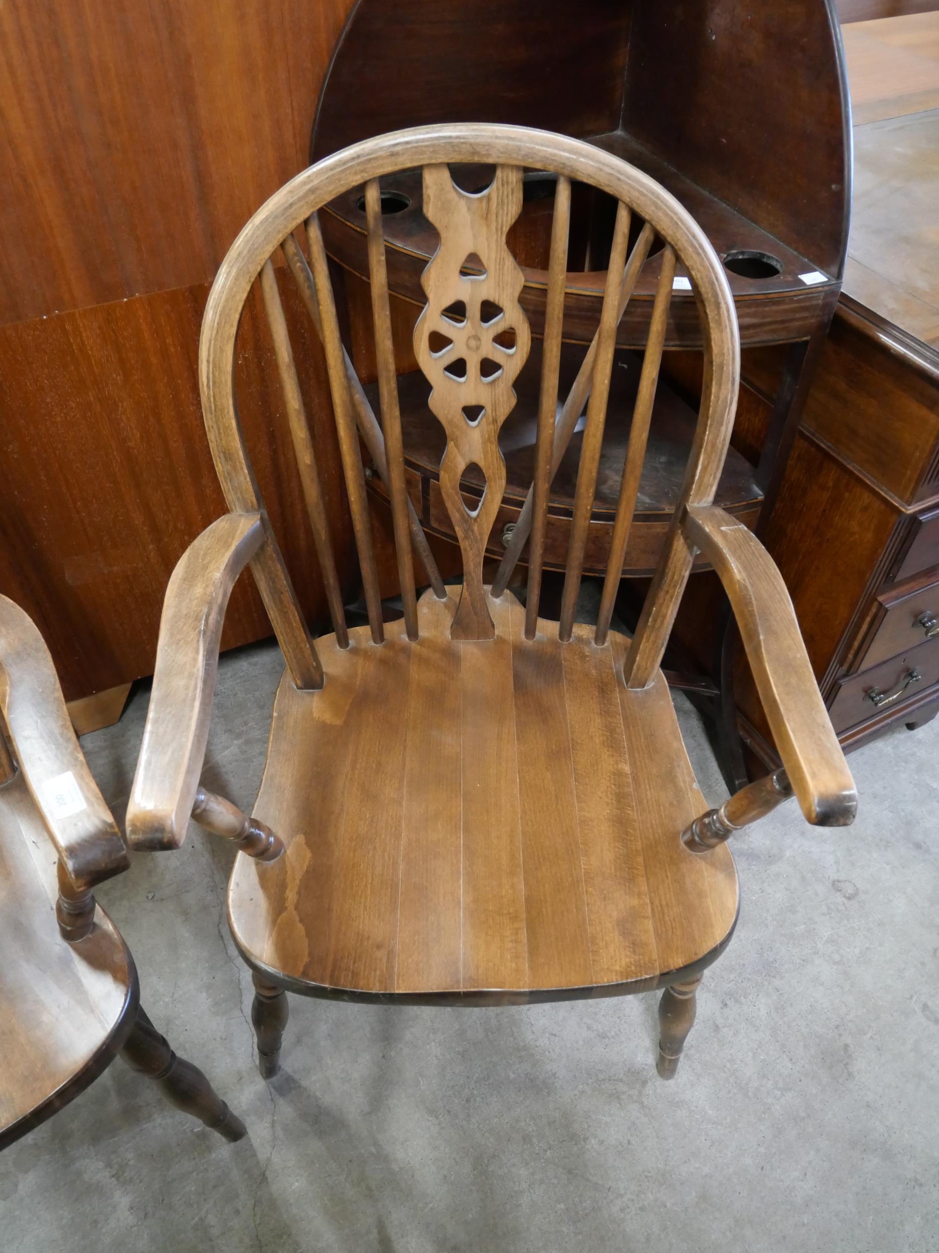 A pair of beech wheelback elbow chairs - Image 5 of 5