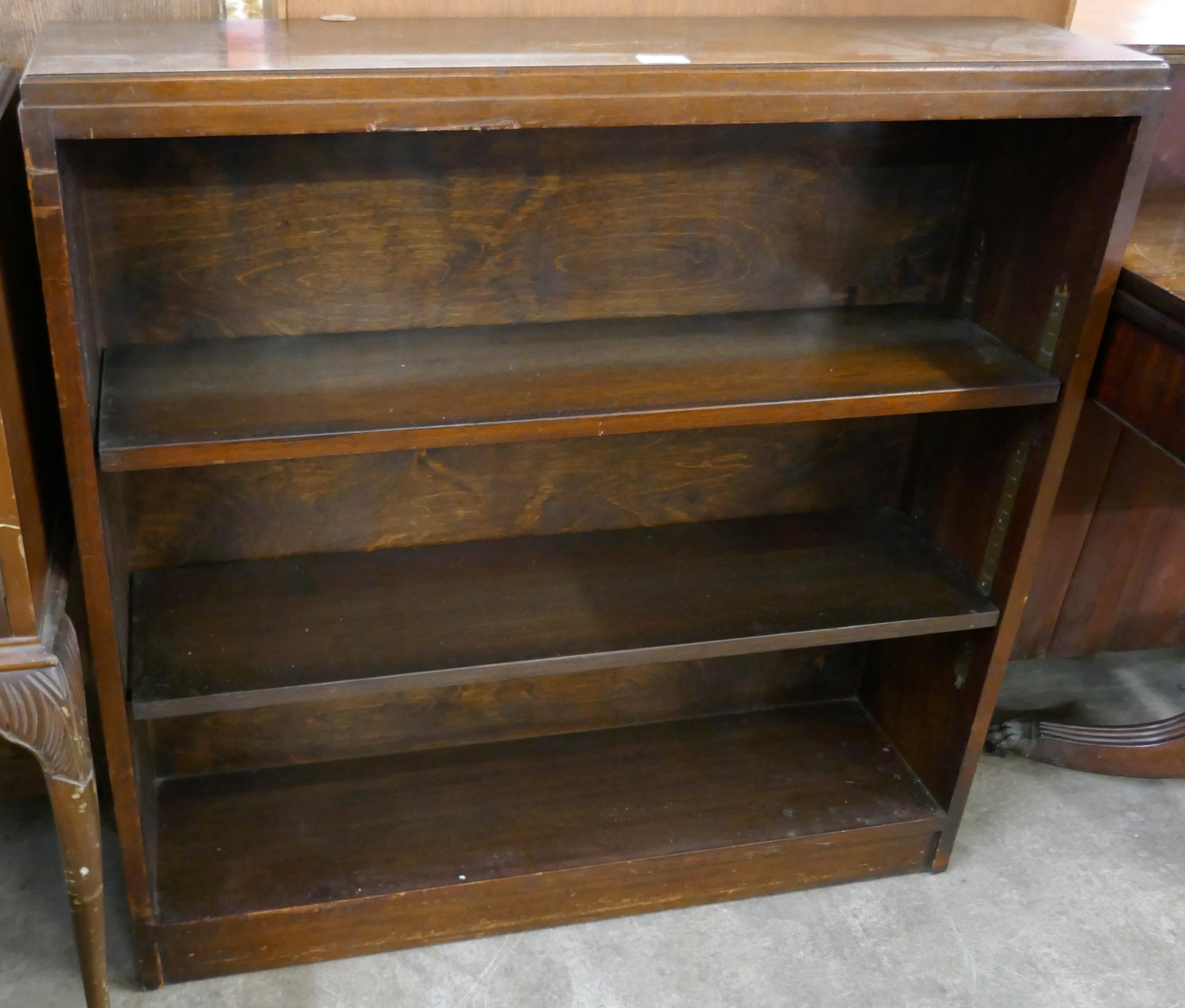 A mahogany open bookcase