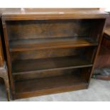 A mahogany open bookcase