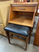 A Chippy teak miniature table/hall seat