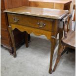 A George II style oak single drawer side table