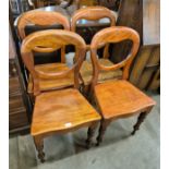 A set of four Victorian mahogany balloon back chairs