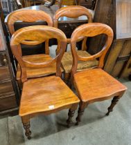 A set of four Victorian mahogany balloon back chairs