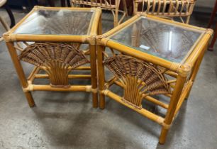 A pair of Italian bamboo and glass topped occassional tables