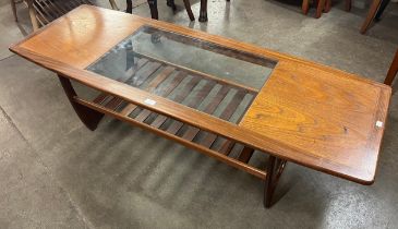 A G-Plan Astro teak and glass topped rectangular coffee table