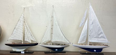 Three model yachts