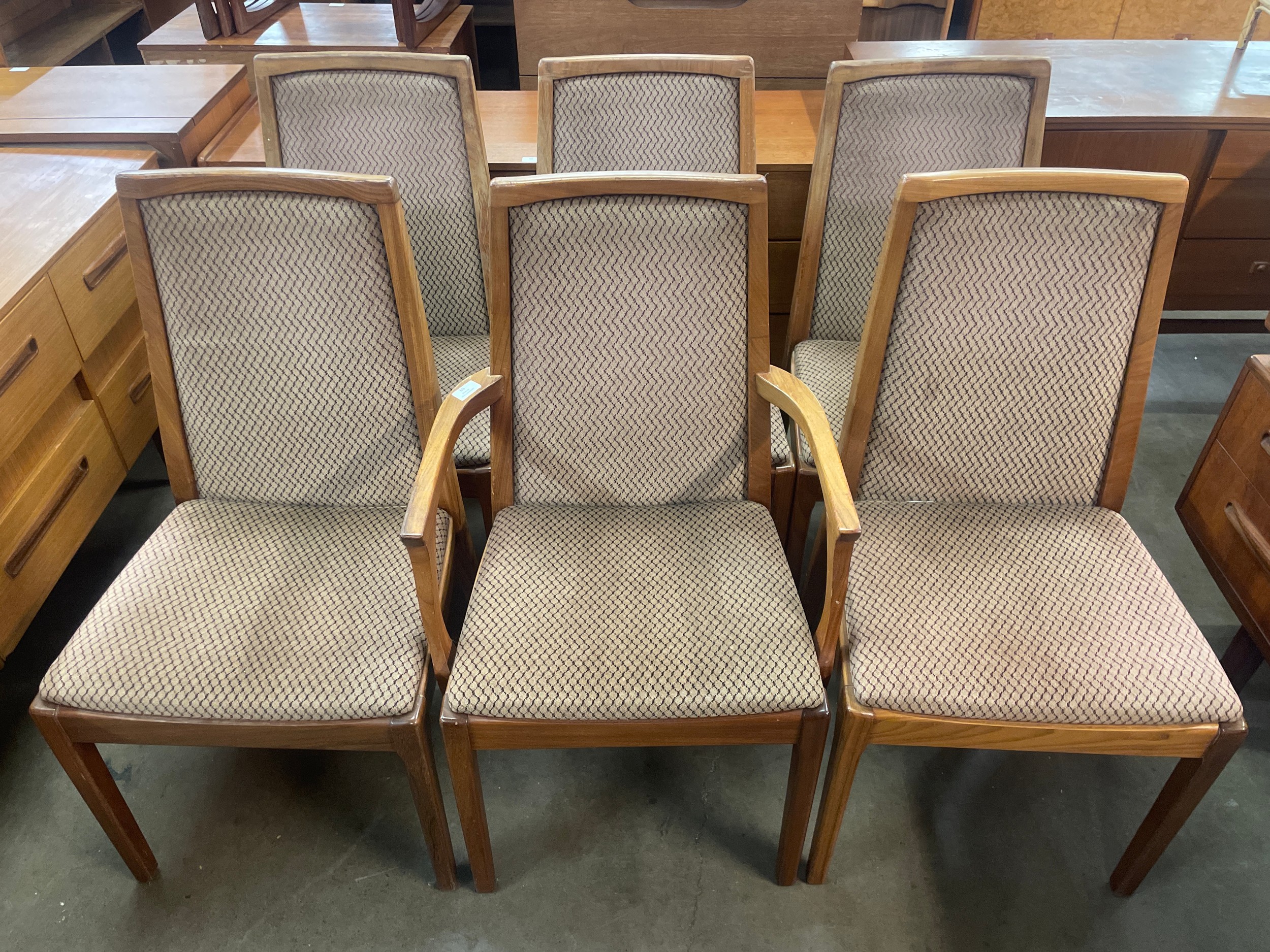 A set of six Nathan teak dining chairs