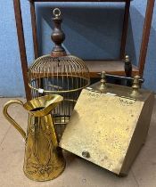 An Art Nouveau brass jug, a brass coal scuttle and a brass bird cage