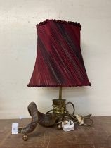 A brass mounted ram's horn table lamp