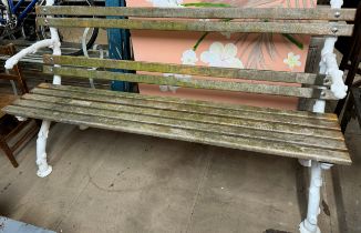 A naturalistic cast iron ended garden bench