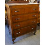 An early 20th Century walnut chest of drawers