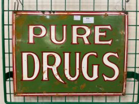 An enamelled Pure Drugs advertising sign