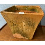 A square terracotta pot