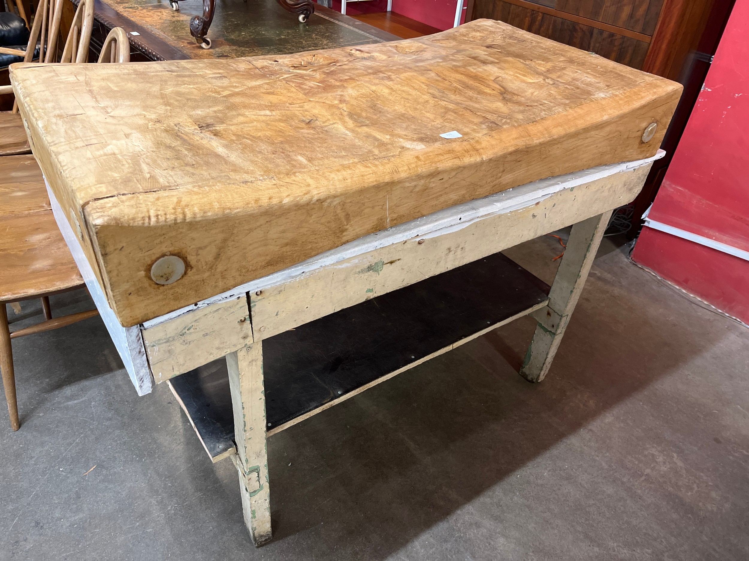 A beech butcher's block, on painted pine stand