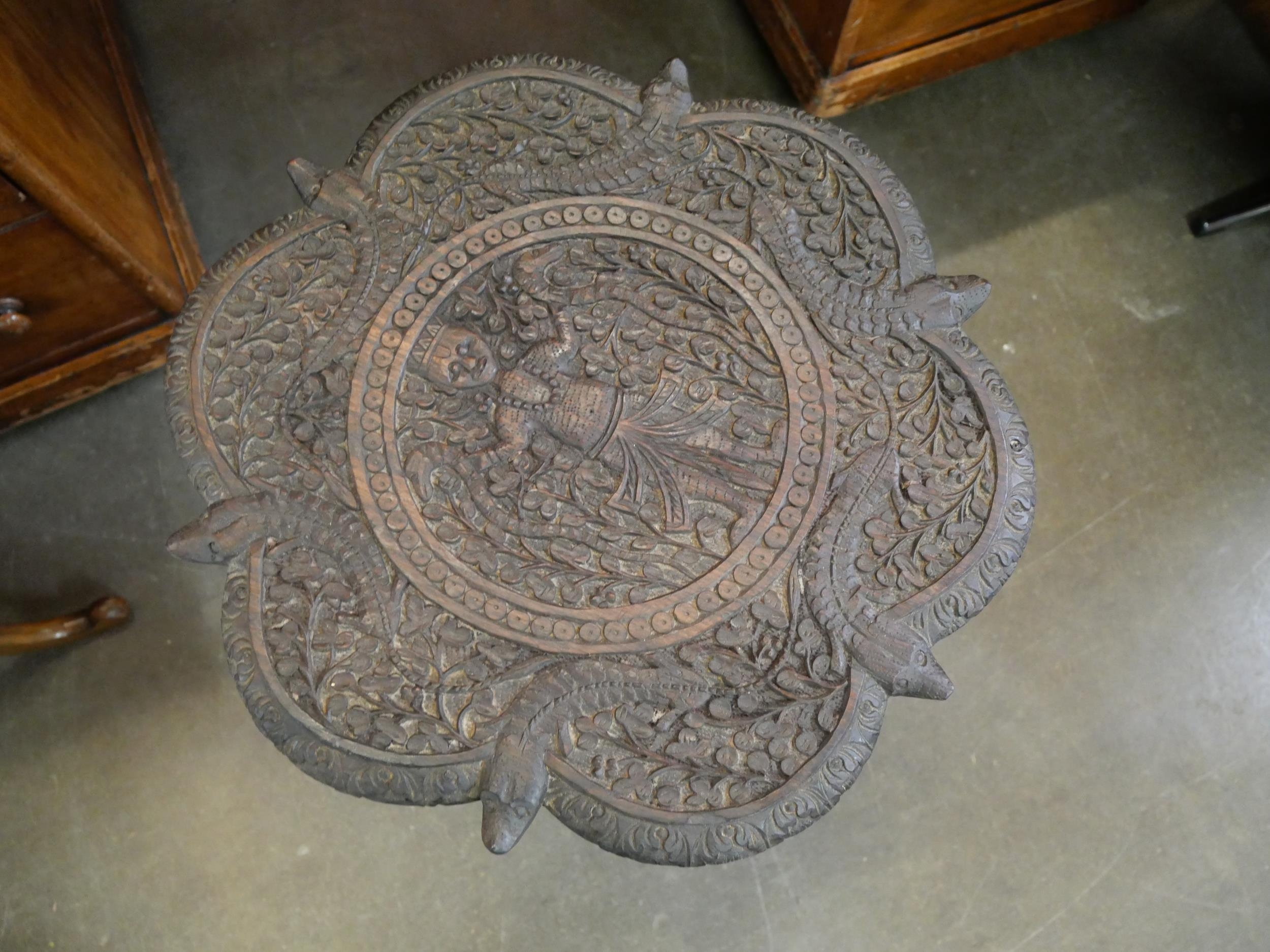 A Burmese carved hardwood occasional table - Image 3 of 5