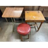 A school desk, an invalid table and a stool