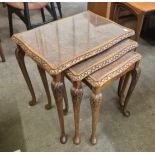 A burr walnut nest of tables