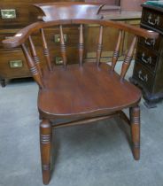 A Victorian beech smokers bow chair