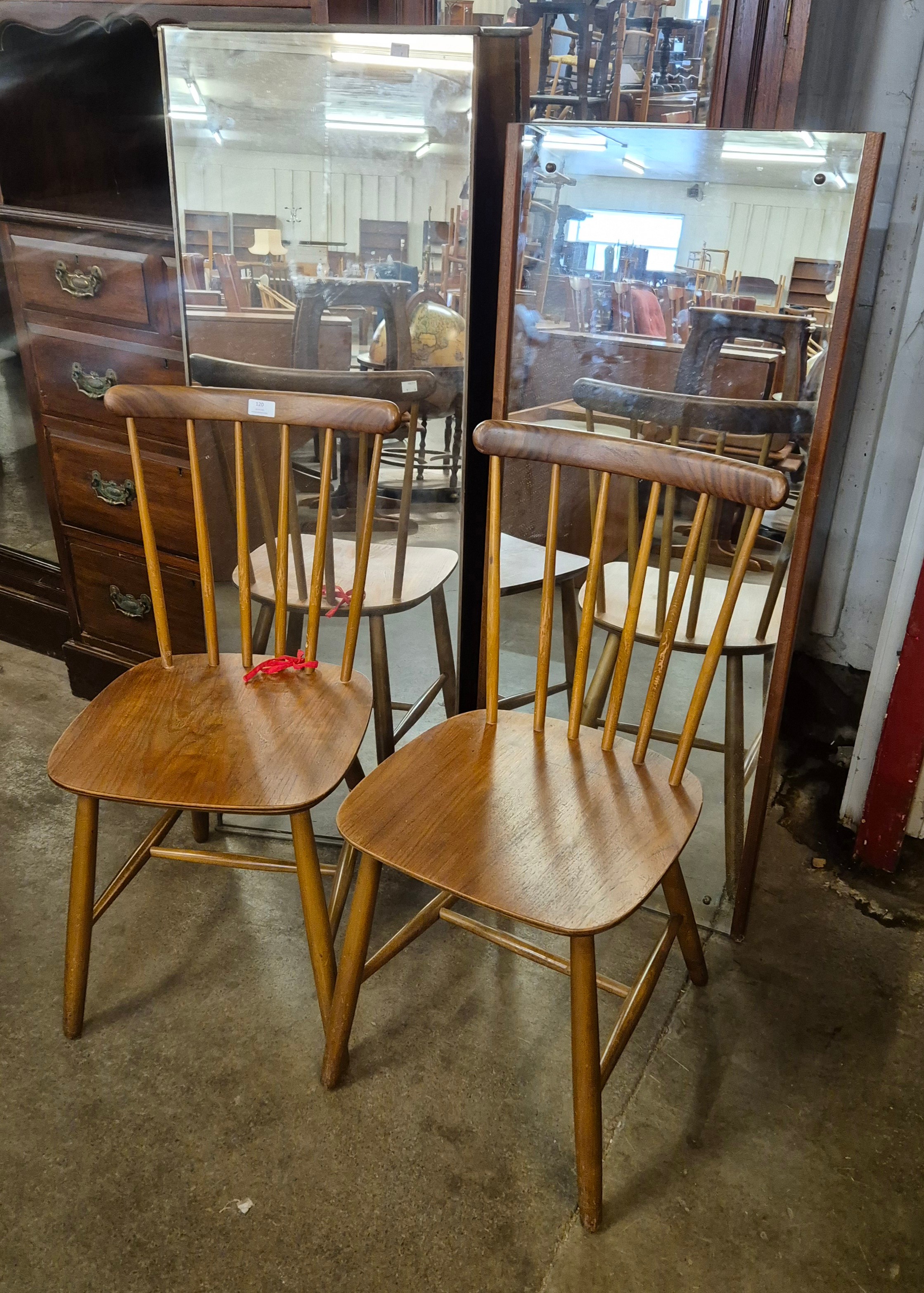 A pair of teak Danish Billund Stolefabrik beech kitchen chairs and two teak framed mirrors