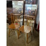 A pair of teak Danish Billund Stolefabrik beech kitchen chairs and two teak framed mirrors