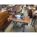 A Jones sewing machine and table