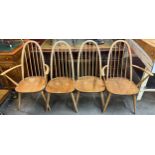 A set of four Ercol blonde elm and beech Quaker dining chairs