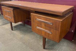 A G-Plan Fresco teak floating top desk