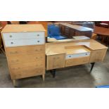 An oak dressing table and chest of drawers