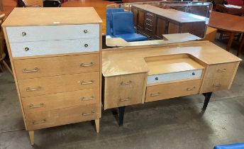 An oak dressing table and chest of drawers