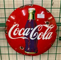 An enamelled Coca-Cola advertising sign