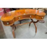 A Regency style inlaid kidney shaped writing table