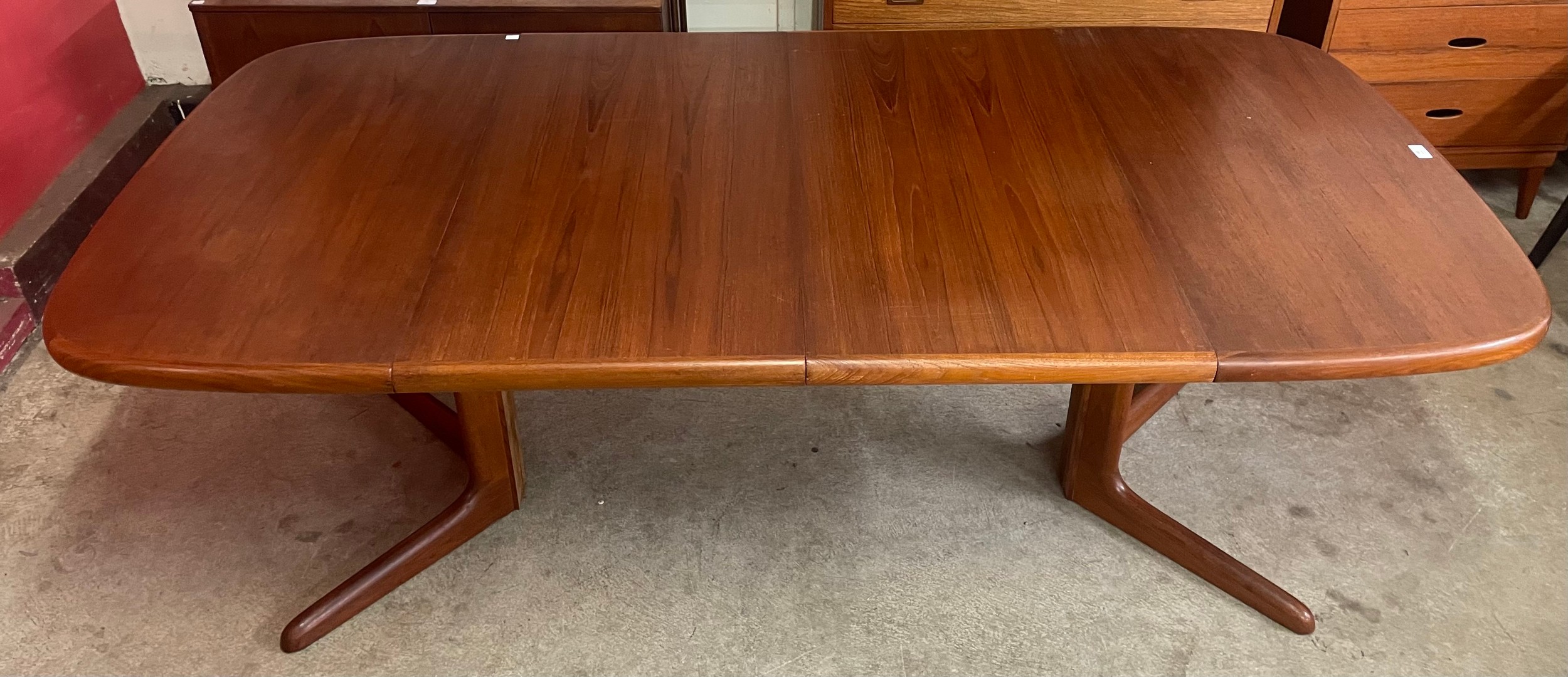 A Danish teak two leaf extending dining table - Image 2 of 2