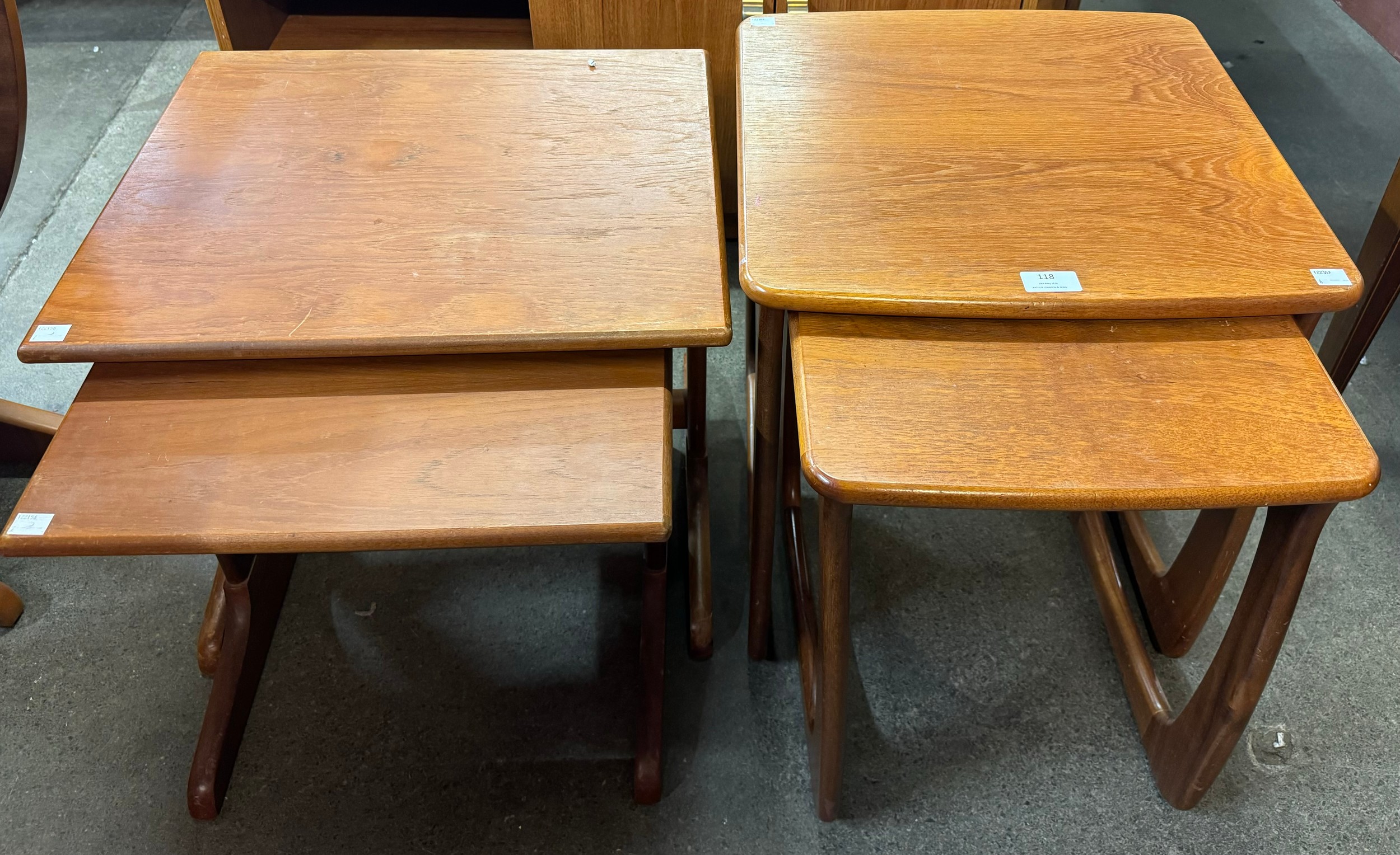 Two teak nest of two tables