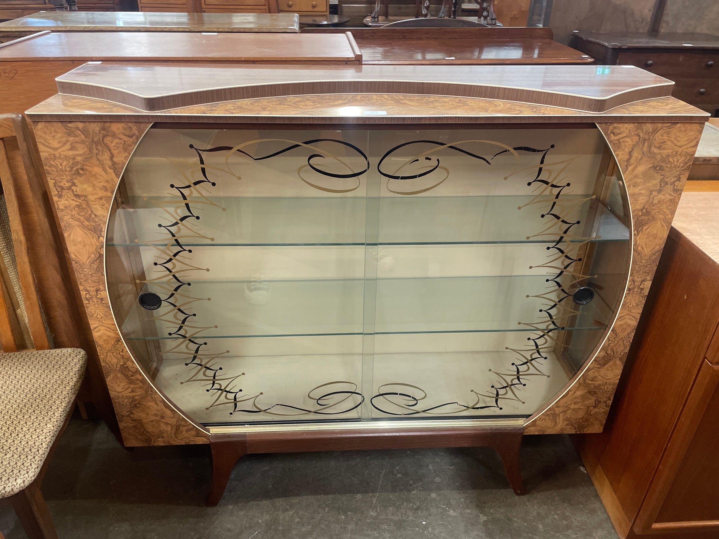 A simulated walnut display cabinet