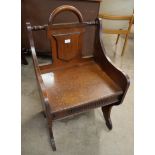 A Victorian Aesthetic Movement oak hall chair