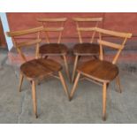 A set of four Ercol Blonde elm and beech green dot stacking chairs