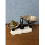 A set of Avery weighing scales and graduated brass weights