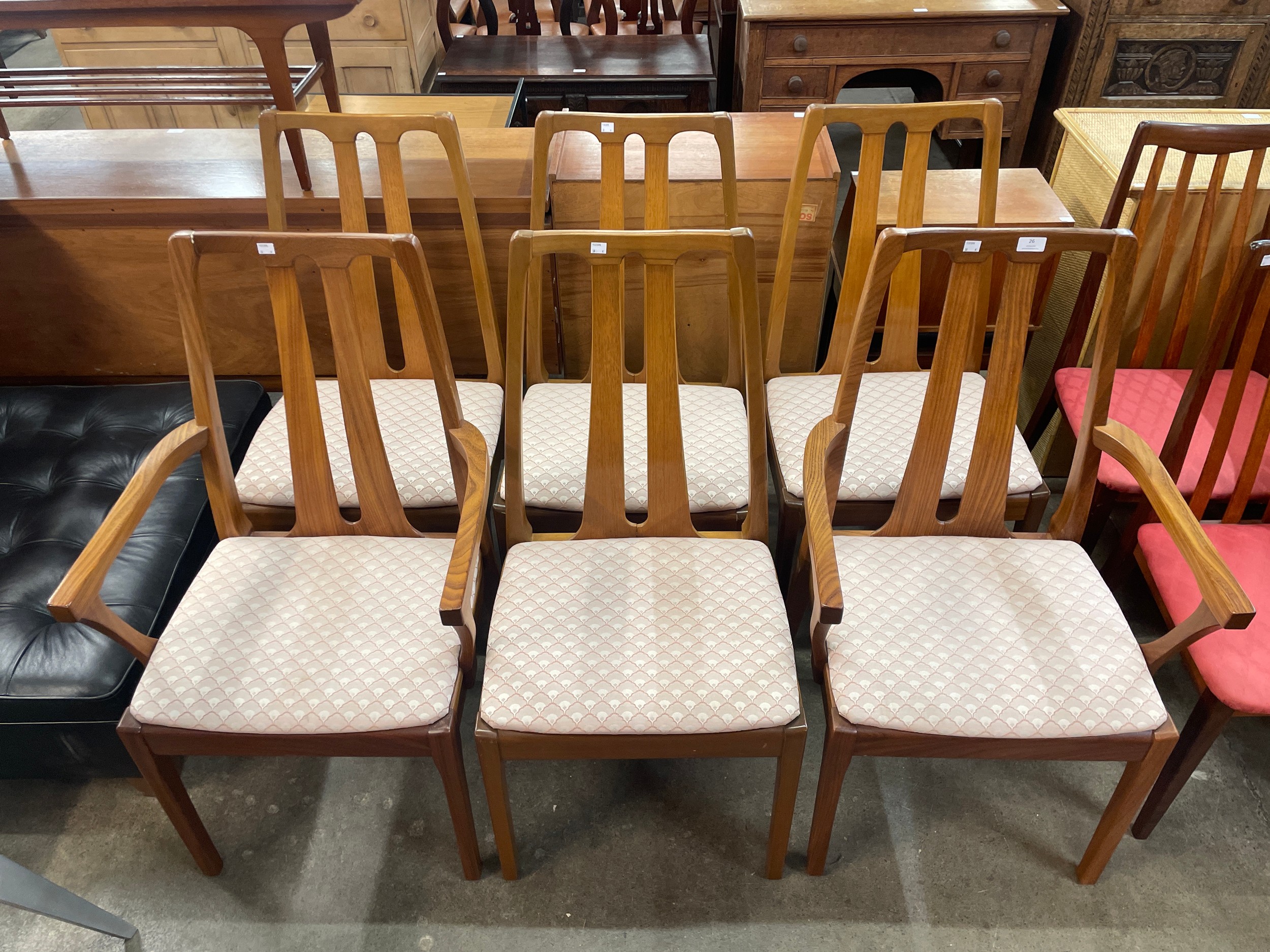 A set of six Nathan teak dining chairs