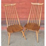 A pair of Ercol Blonde elm and beech Goldsmith chairs