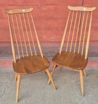 A pair of Ercol Blonde elm and beech Goldsmith chairs